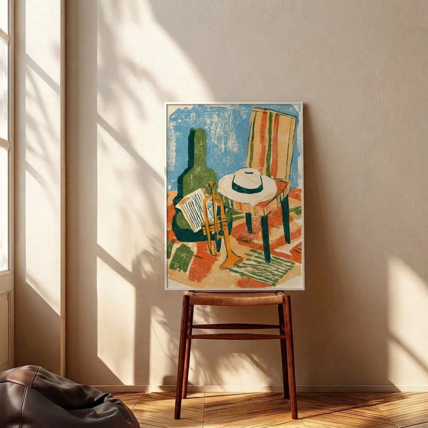 Vintage-style linocut artwork displaying desert-inspired objects including a potted cactus, acoustic guitar, wooden chair, and wide-brimmed hat against a cream background in warm retro colors.