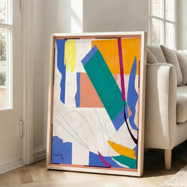 Colorful cut-paper art print on a wall displaying bold abstract forms in tropical hues, inspired by Oceanian culture and nature.