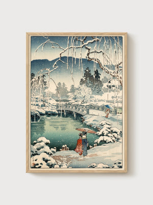Ukiyo-e Winter Bridge Scene poster in oak frame