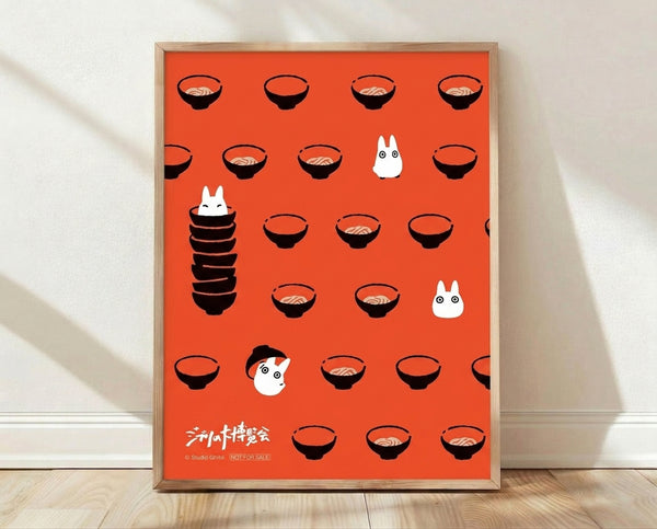 Minimalist anime poster featuring stylized ramen bowls and spirit characters in tomato red, black, and cream tones, framed wall art with whimsical Ghibli-inspired aesthetic.