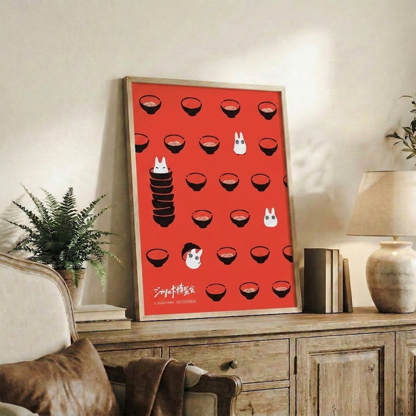 Minimalist ramen bowl illustration with magical spirit-inspired elements in a striking coral red, black, and cream color scheme, Studio Ghibli-influenced artwork.