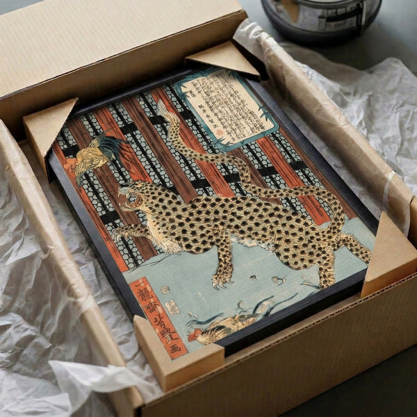 Japanese woodblock wall print capturing a crane and leopard in serene composition with gold embellishments, deep black outlines, and cream-colored ground.
