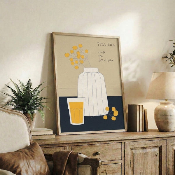 Minimalist floral poster showing a single vase of yellow mimosa blooms outlined in delicate black strokes, framed modern botanical wall decor.