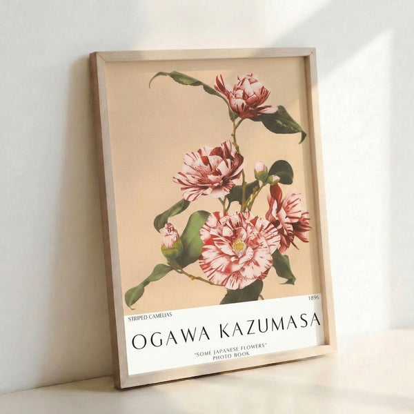 Serene camelia flower art print in soft palette of rose pink, deep red, and sage green with pale yellow accents, classic vintage botanical style framed and displayed.