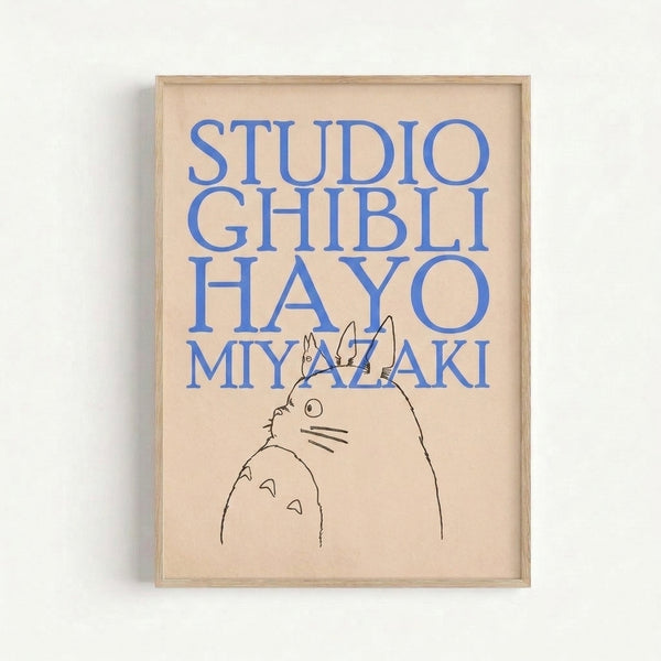 Framed art print featuring a contemplative Totoro design rendered in simple black lines against a cream background with blue typographic elements.