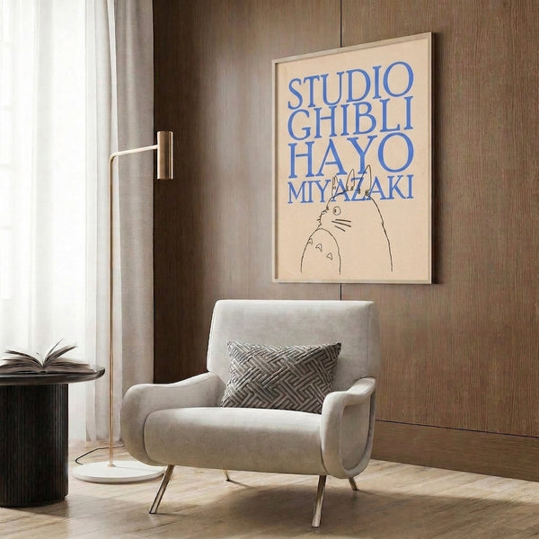 Framed wall art combining a serene Totoro illustration and typography in cream, black, and blue with clean, contemplative linework.