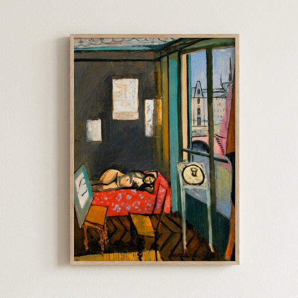 Framed print of Matisse's famous studio scene with abstracted architectural forms in earth tones and cobalt blue, capturing light and spatial depth.