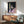 Abstracted portrait with organic, blurred forms in a muted palette of taupe and deep tones, framed wall art suggesting psychological depth and distortion.