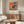 Abstract wall art interpreting the tragedy of the arena through distorted form and chiaroscuro in burnt sienna, black, and grey tones, capturing haunting psychological depth and human mortality.