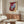 Contemporary art poster depicting a fragmented papal figure in expressionist red and grey, capturing an intensely haunting mood through abstraction.