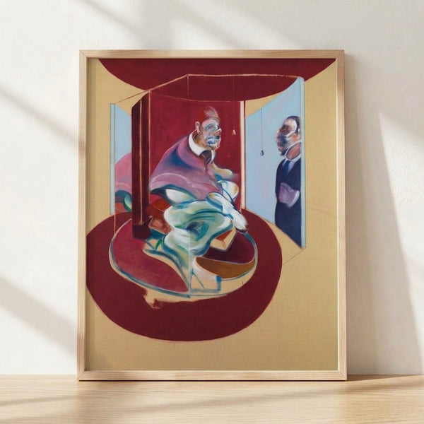 Abstract portrait study of a pope figure rendered in bold reds and dark tones, displayed as a framed art print on a wall.