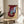 Haunting Francis Bacon-style portrait of a red pope with distorted, expressive brushwork in rich crimson and black hues, framed as a poster.