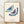 Framed minimalist line art print featuring two butterflies with delicate wings in navy, teal, and purple on a cream background, displayed as elegant wall decor.