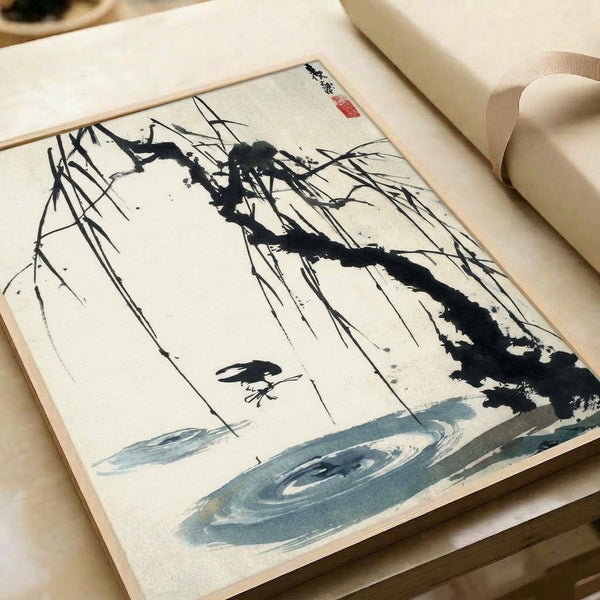 Meditative Japanese art print showing a single bird among willow branches reflected in water, capturing zen minimalism through restrained brushwork in monochromatic and blue tones.