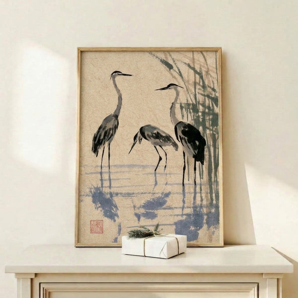 Japanese-inspired ink painting featuring three wading birds in a wetland setting, rendered in soft gray and cream with bold black brushstrokes in contemplative Japandi style.