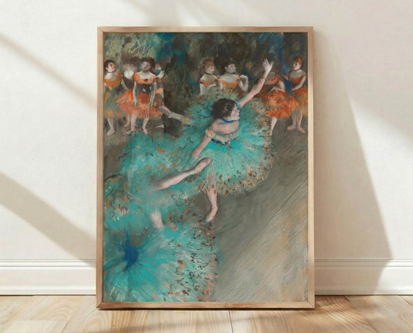 Framed poster of a graceful ballerina in a flowing green dress, captured in a moment of fluid movement with soft, impressionistic brushstrokes in muted tones.