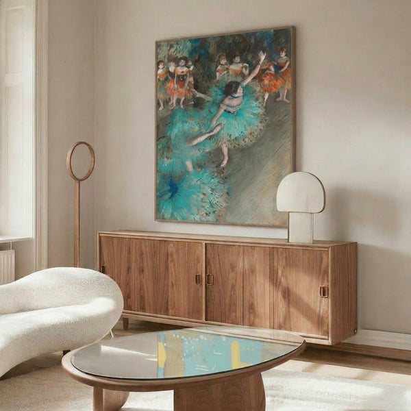 Framed artwork depicting a poised dancer in a flowing green gown, created in the impressionistic manner with soft, blended tones and a tranquil, artistic mood.