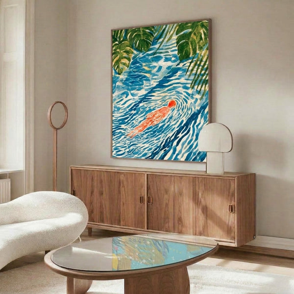 Japanese-inspired watercolor art print of a tranquil swimmer immersed in a blue stream beneath oversized green leaves, capturing a peaceful mood through soft brushwork and a harmonious palette of deep blue, cream, and earthy tones.