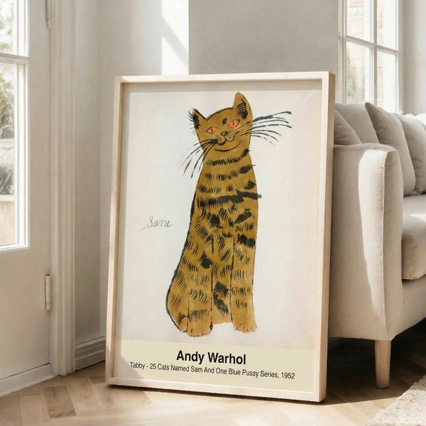 Framed pop art poster featuring a tabby cat in soft orange, cream, and black—a nostalgic, warmly rendered composition with contemporary artistic flair.