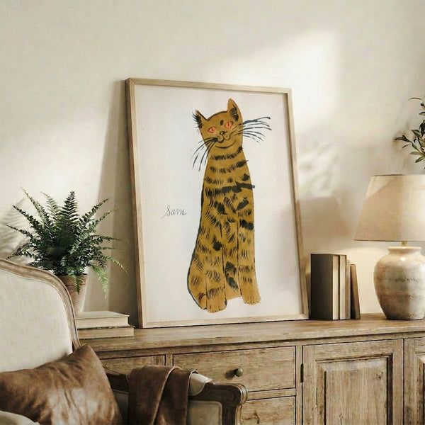 Pop art style framed poster with a cheerful grid of tabby cats rendered in bold, contrasting colors including orange, pink, green, and one cool blue cat.
