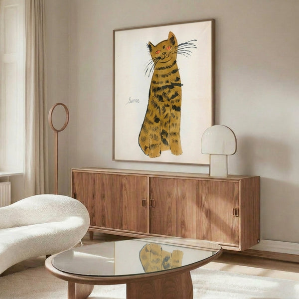 Pop art wall art featuring multiple tabby cat faces in bright pops of color including orange, purple, and lime, with one uniquely blue cat in the composition.