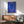 Framed modern art print with a minimalist fish motif in hot pink and deep blue, exemplifying clean Bauhaus design for minimalist wall decor.