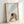 Serene wabi-sabi inspired poster of oolong tea preparation with graceful hands and cup, executed in soothing cream and tan hues with zen aesthetic.