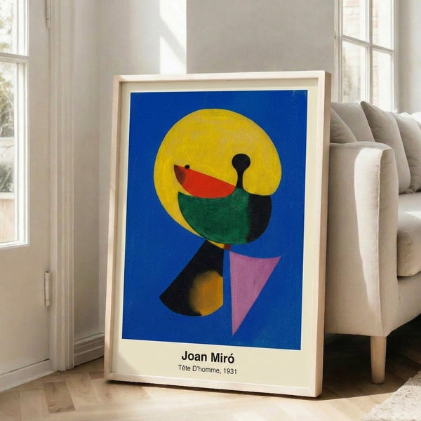 Framed contemporary art print showcasing an abstract portrait built from geometric shapes and neutral earth tones, exemplifying minimalist intellectual expression.