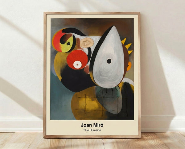 Abstract surreal human head in cream, black, and rust tones, framed as a modernist art print on a wall.