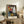 Surreal Bauhaus portrait exploring abstraction with black, ochre, and cream palette, framed wall art.