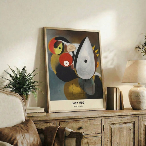 Surreal Bauhaus portrait exploring abstraction with black, ochre, and cream palette, framed wall art.