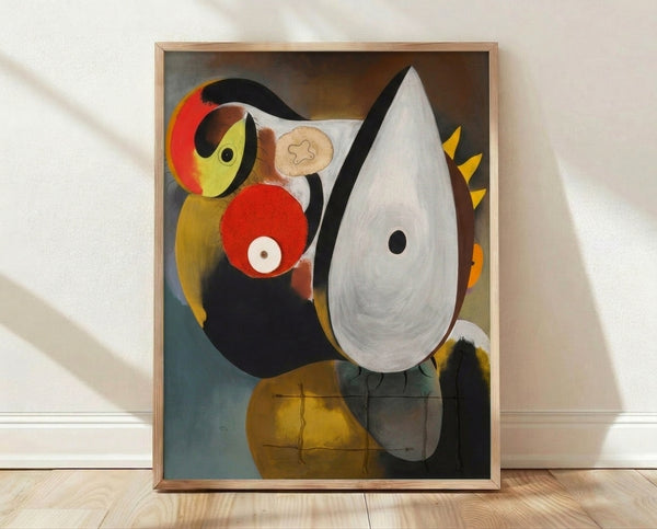 Abstract portrait with geometric shapes in black, red, and cream tones, featuring simplified facial forms in modernist style, framed on wall.