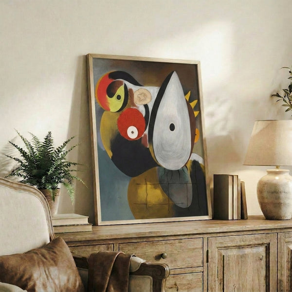 Cubist-inspired portrait with fragmented facial features in red, cream, and charcoal hues, displayed as a wall-mounted art print.