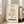 Japandi home decor print showcasing a coffee cup with ascending steam in neutral cream and tan tones, balancing simplicity with emotional depth.