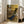 Impressionist masterpiece poster featuring elegant ballet dancers during a lesson, showcasing soft brushwork and a refined palette of beiges, soft blues, and golden accents.