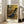Ballet studio scene in impressionist style with delicate cream and brown tones, portraying dancers in poised, refined moments as a framed art print.