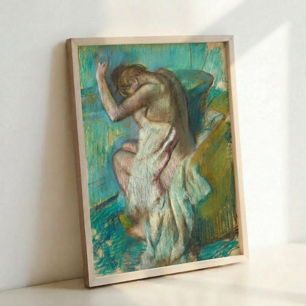Framed poster showing a figure at a basin in soft watercolor hues, exemplifying classic Impressionist portraiture with gentle color harmonies.