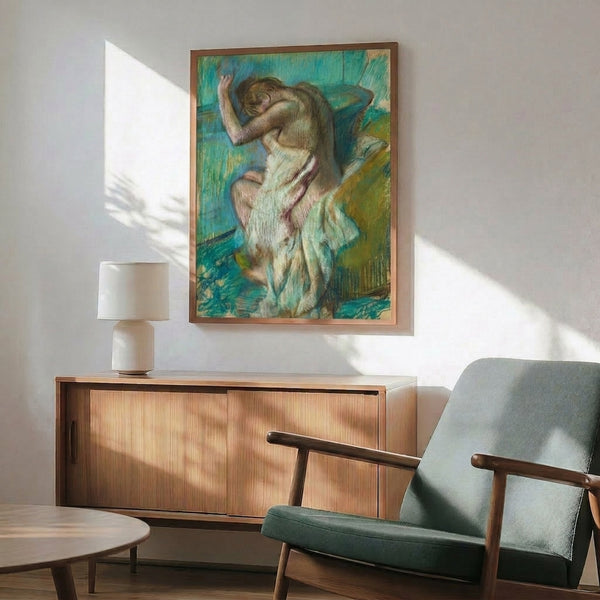 Impressionist masterpiece showing a figure at her toilette in soft, blended colors creating an intimate and reflective mood.