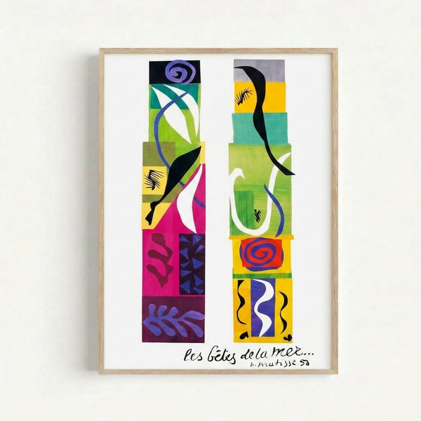 Framed modern art print with bold colored paper cutouts depicting stylized sea creatures and flowing aquatic elements.