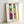 Contemporary wall art showcasing playful abstract shapes in jewel tones arranged as an imaginative underwater composition.