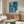 Contemporary art poster of The Blue Window rendered in cool color tones with simplified forms and a serene, wabi sabi-inspired aesthetic.