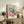 Framed modern art print of a sun-drenched Nice harbor, featuring stylized boats in bold blues and coral, reflecting Matisse's Art Nouveau aesthetic and leisurely atmosphere.