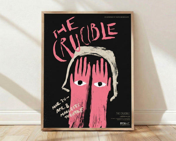 Retro pop art poster featuring an intense close-up portrait of a woman's face in hot pink, cream, black, and white; dramatic and haunting theatrical artwork for The Crucible.