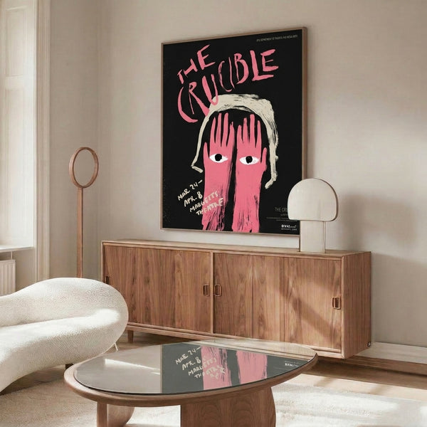 Vintage-inspired pop art poster of a woman's face with a haunting, dramatic expression rendered in hot pink, cream, and black tones; striking theatre art for any room.