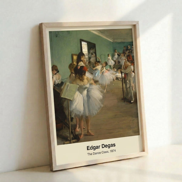 Framed impressionist artwork depicting graceful female dancers in a ballet studio, bathed in soft cream and ochre hues with contemplative mood.