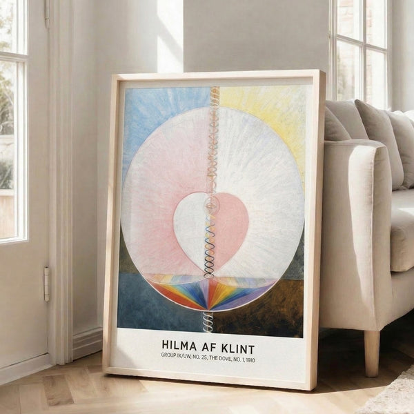 Transcendent geometric wall art combining circles, spirals, and heart shapes in cream, pale pink, and soft blue within a Bauhaus aesthetic.