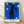 Abstract framed poster of Matisse's The Fall of Icarus with a stylized figure against a royal blue night sky, rendered in bold black, yellow, and red shapes in modernist style.