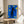 Jazz era-influenced poster art of The Fall of Icarus with striking geometric abstraction in blue, yellow, and black tones, framed for wall display.