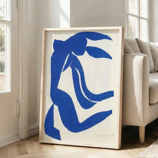 Abstract framed poster featuring graceful curved forms in warm and cool pastels, evoking a sense of movement and harmony through simplified, flowing design.