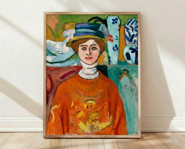 Framed poster of a portrait featuring a girl with striking green eyes and warm skin tones, rendered in bold expressive brushstrokes characteristic of modern art movements.